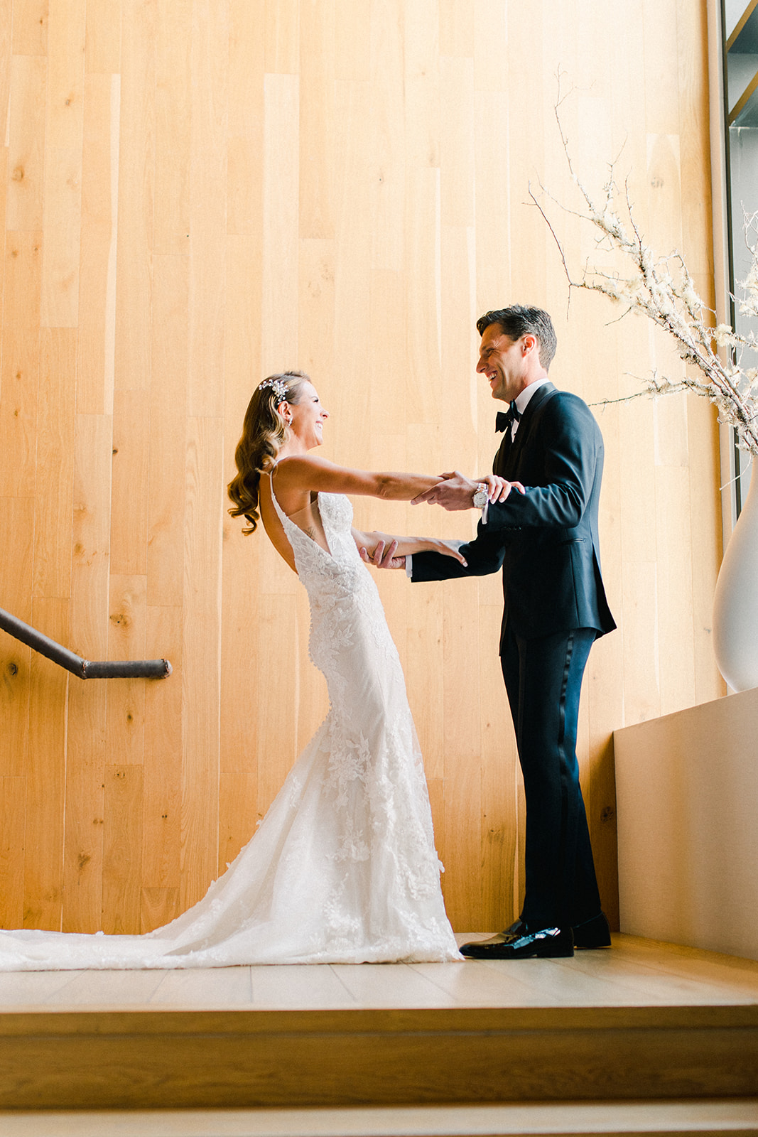 Bride and Groom Sharing First Look on Stairs at Blue Sky Lodge