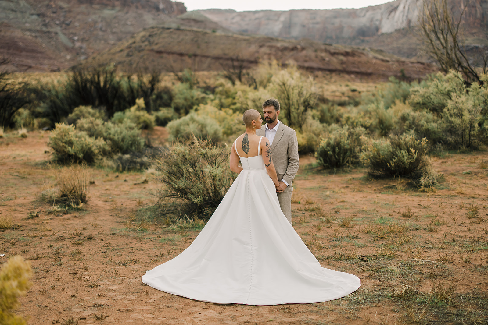 Bride and Groom Wedding Portraits at Red Earth Venue Desert Landscape